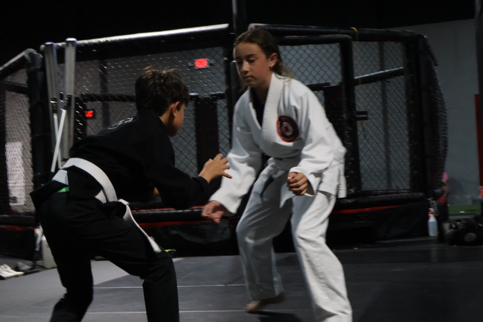 Two kids squaring off in gi at South Tampa Jiu-Jitsu